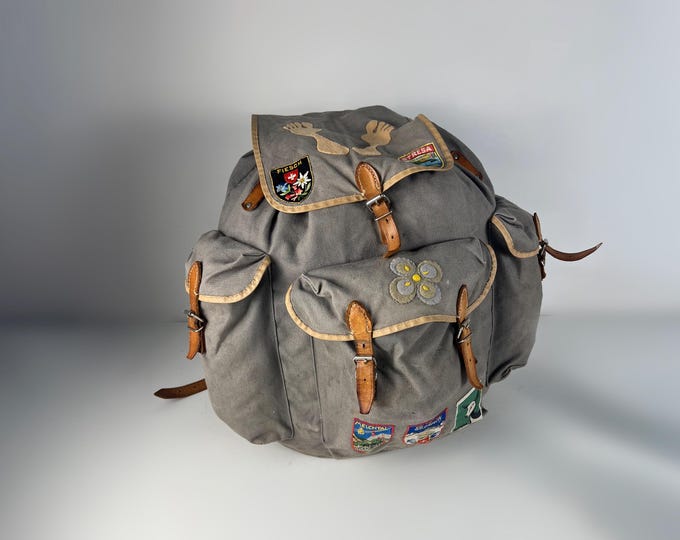 Lovely 1970s backpack, rucksack in gray cotton canvas and leather with metal frame. GDR 1970's