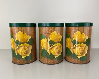 Set of 3 vintage Tomado Holland storage tins, yellow roses on wood decor, mid century home decor from the  1970s