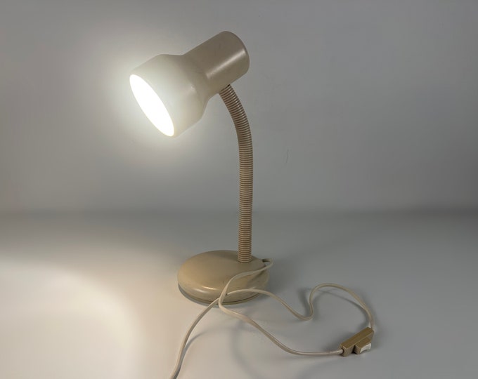 Nice vintage light beige metal and plastic retro table or desk lamp from the 1970s