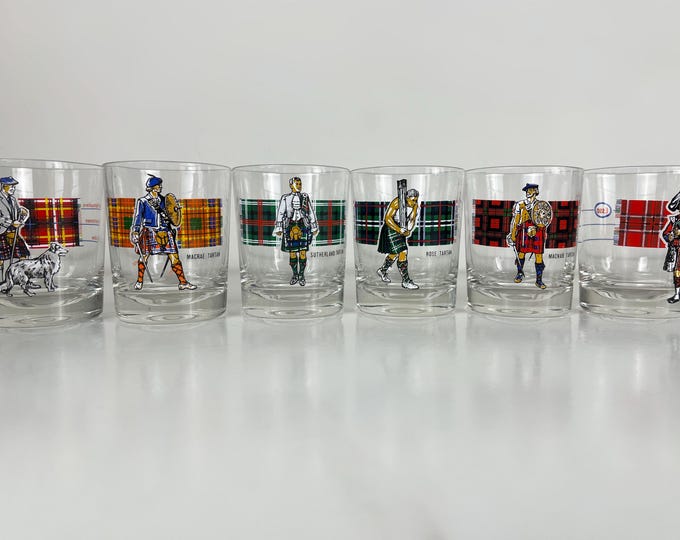 Set of 6 vintage whiskey glasses, with pictures of tartans with matching fabrics, barware from the 1970s.