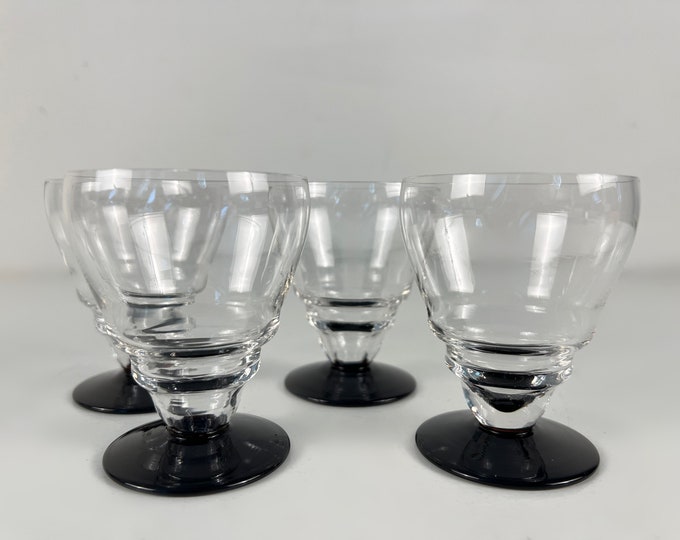 Sets of 4 small Art Deco crystal wine glasses, clear glass chalice and black glass base, hand made from the 1930s