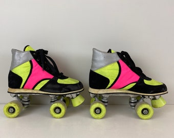 Vintage 80s Retro Roller skates black, neon yellow, silver and pink. Size: EU 37 USwoman 5.5, UK 4.0