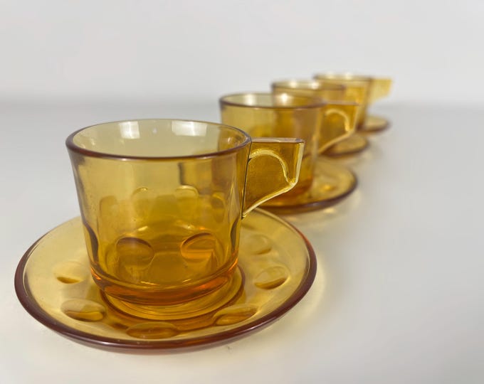 Lovely amber colored glass demi tasse coffee, espresso cups, set of 4 or 5, mid century modern design 1960's