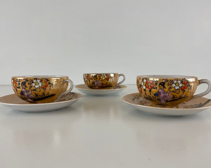 Set of 3 vintage iridescent pearl China porcelain cups and saucers, peach base with a hand painted flowery geisha decor