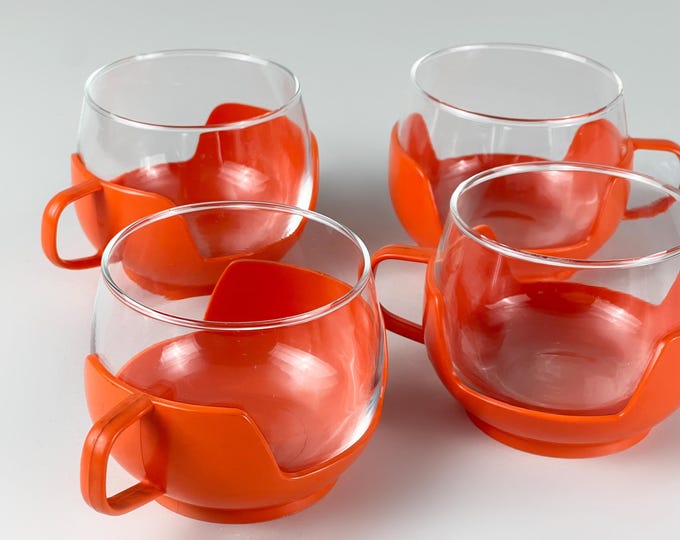 Set of 4 or 5 vintage tea glasses with range colored plastic holders, tea cups from the 1970s