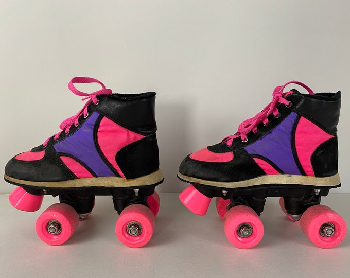 Vintage ‘80s children's roller skates in black and neon pink and purple, Size: EU 31, UK 12, USA 13