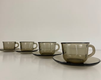 Sets of 2-6 smoked glass coffee cups with saucers, Arcoroc France, lovely mid century design from the 1970's