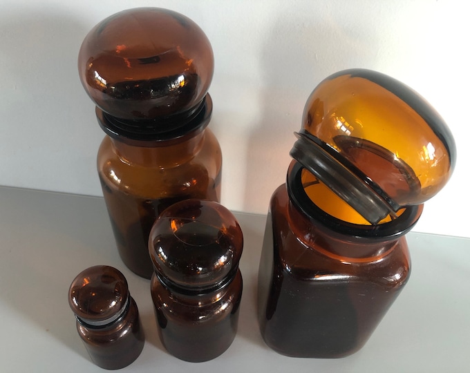 Pharmacist bottles, pharmacy jars with bubble stopper, Very decorative set of four amber colored pharmacist stop bottles