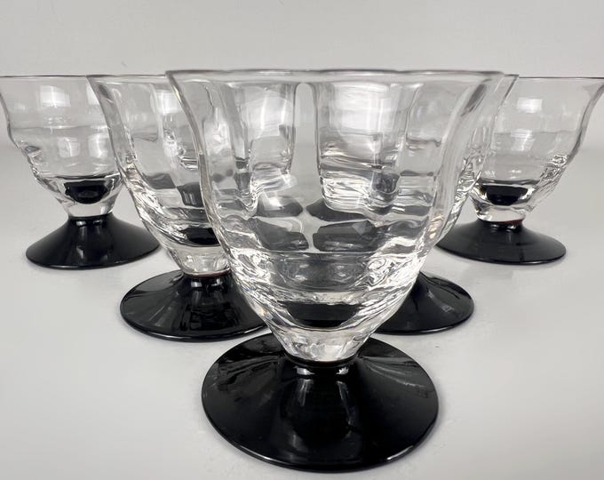 Sets of 7 small Art Deco wine glasses, clear glass chalice and black glass base, hand made from the 1930s
