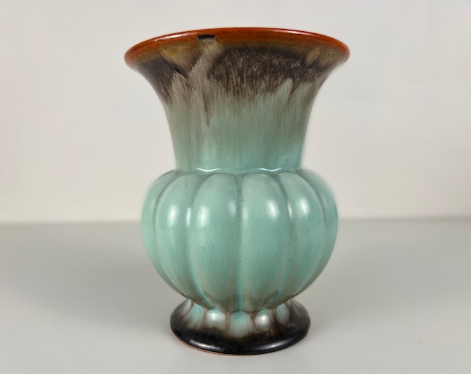 Beautiful vintage vase in light blue with brown and orange/red details. 1970s