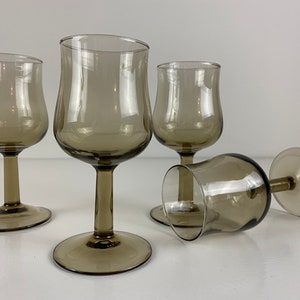 Set of 4, 5 or 6 Arcoroc France, SMALL smoked glass wine glasses, mid century modern barware from the 1970s