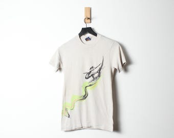 Camiseta vintage de costura sencilla Ocean Pacific, fabricada en EE. UU., de los años 80 (talla pequeña/mediana) para jóvenes