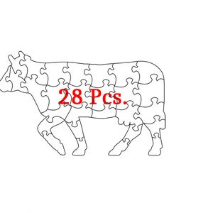 May include: A black and white line drawing of a cow puzzle with 28 pieces. The text "28 Pcs." is written in red inside the cow's body.