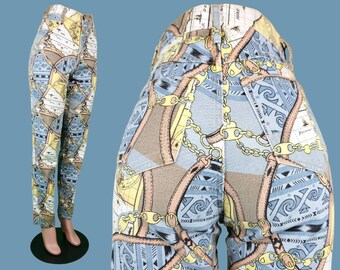 Novelty 80s/90s graphic jeans. High rise tapered legs. Maps ships nautical old world kitsch. (Modern size 10)