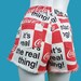 Vintage novelty Coca-Cola shorts. 90s graphic denim cut-offs. Size 28.