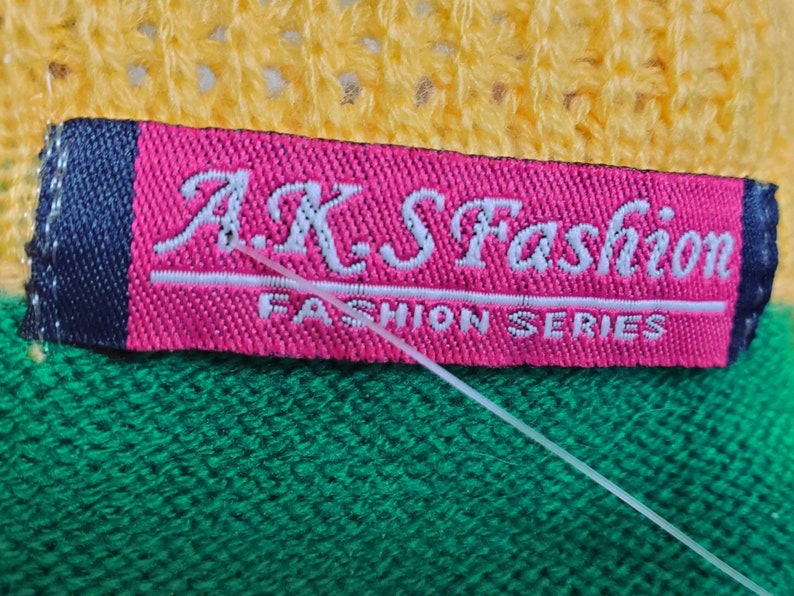 Unique deadstock pullover sweater. Vintage 80s. Bodycon, micro-mini, vibrant, rastafarian, red yellow green, scalloped pattern. XS image 10