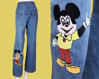 Mickey Mouse Wrangler jeans from the 70s. Unique pockets embroidered leg high rise slim fit. Cartoon Disney. (28 x 33)