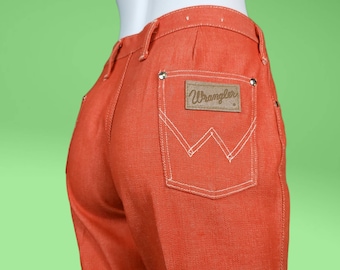 Vintage 60s orange Wranglers. 60s mod. Mid-low rise. Bootcut flare. Like new. Size S.