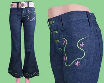 1960s embroidered bell bottoms. Like new vintage hip hugger jeans. Pink, green, blue flowers. Crewel stitching. By Lee. (S)