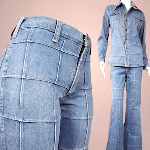 May include: Light blue denim patchwork pants and matching long-sleeve button-up shirt. The jeans have a flared leg and a unique grid-like design. The shirt has a collar and two chest pockets. The outfit is displayed on a mannequin.