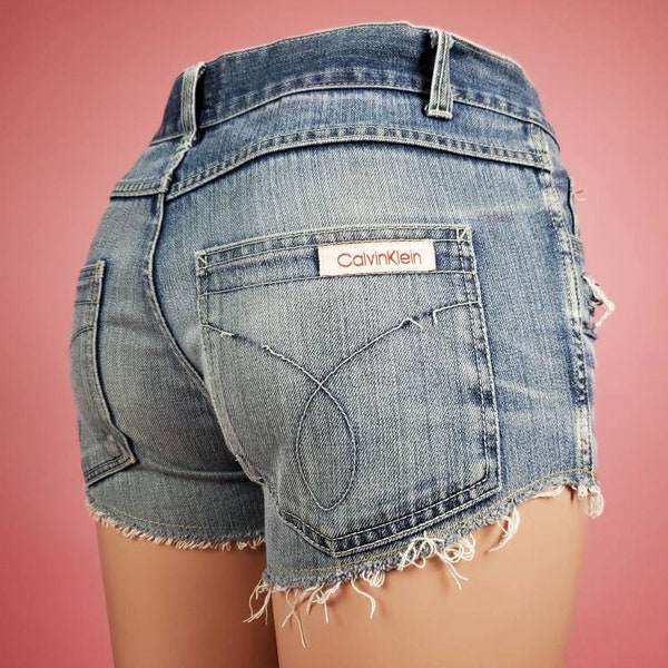 Calvin Klein denim shorts. Vintage beautifully distressed denim cut-offs. Hot, hot, hot! (28)