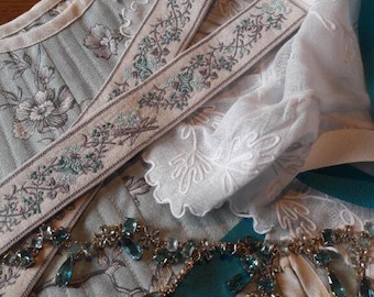 Pair of 18th-century Cupid garters in cotton and grosgrain or twill ribbon