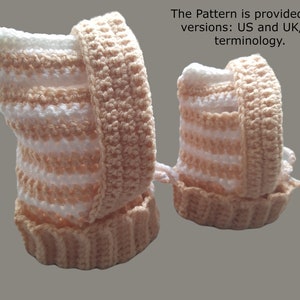 May include: Two crocheted baby booties in a peach and white striped pattern. The booties are made with a soft yarn and have a simple design.