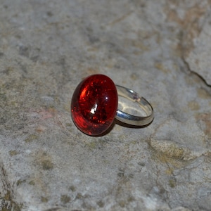 Colored glass tear on adjustable gold or silver ring
