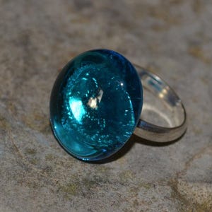 Colored glass tear on adjustable gold or silver ring