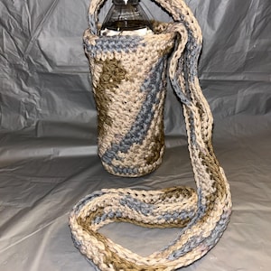 Cartera o bolso tipo bandolera para teléfono o botella de agua con puntadas de estrella en color marrón, gris y tostado. ¡LISTO PARA ENVIAR!