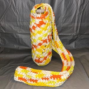 Cartera o bolso tipo bandolera para teléfono o botella de agua con puntadas de estrellas en amarillo, naranja y blanco. ¡LISTO PARA ENVIAR!