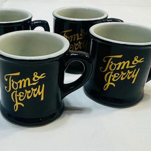 シェナンゴ陶器会社 トムとジェリー ブラックゴールド ヴィンテージ コレクタブルマグカップ 4個セット