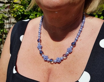 A lovely necklace using handmade beads in lilac hues