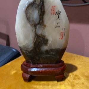 Marble statue with Chinese script