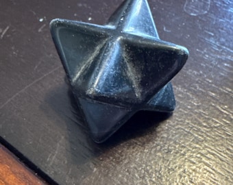 Black shungite carved merkaba star