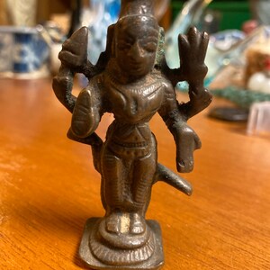 Antique bronze statue of standing Vishnu