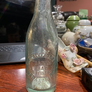 Antique Krim’s beverage company blue bottle