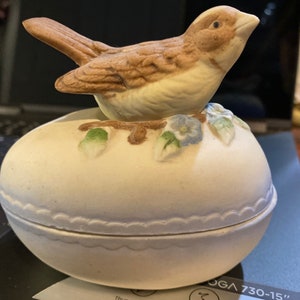 Bisque bird on egg trinket box