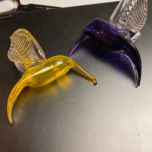 2 glass hummingbirds