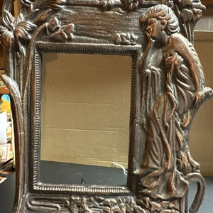 Cast iron art deco frame with copper patina