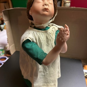 Julia good Kruger at prayer doll