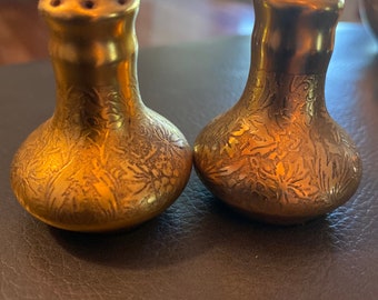 Beautiful gold gilded salt and pepper shakers