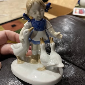 Vintage GDR girl with geese figurine.