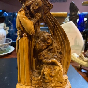 Carved wood nativity scene