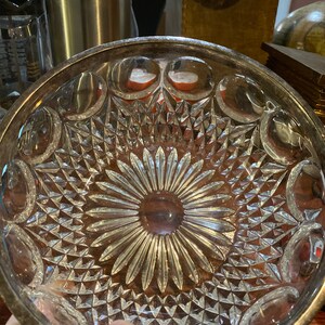 Glass thumbprint bowl with silver rim