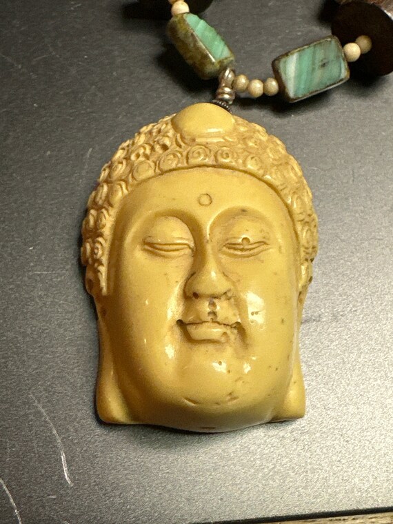 Carved Buddha face necklace - image 2