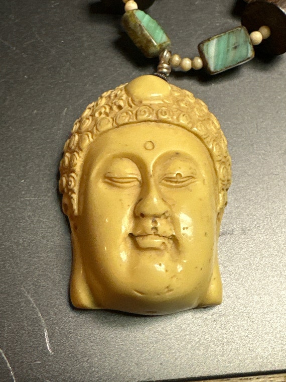 仏顔彫刻ネックレス - Etsy 日本