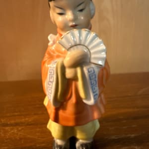 Vintage ceramic figurine made in occupied Japan