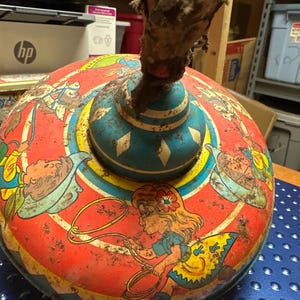 Ohio art metal spinning top