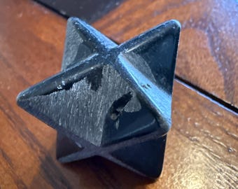 Black shungite carved merkaba star